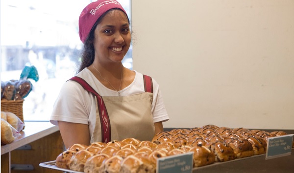 Bakers Delight staff with hot cross buns